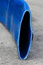 Click to enlarge - Extremely robust layflat hose designed for the most arduous conditions found in off-shore and bunkering applications.
Made from a very tough PU material and reinforced with high tensile polyester fibres, this hose is well suited to difficult working conditions. The hose can be fitted with two earthing wires contained within the black strap.